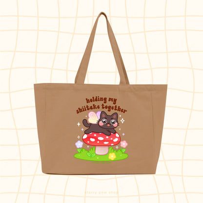 Holding my shiitake Tote Bags